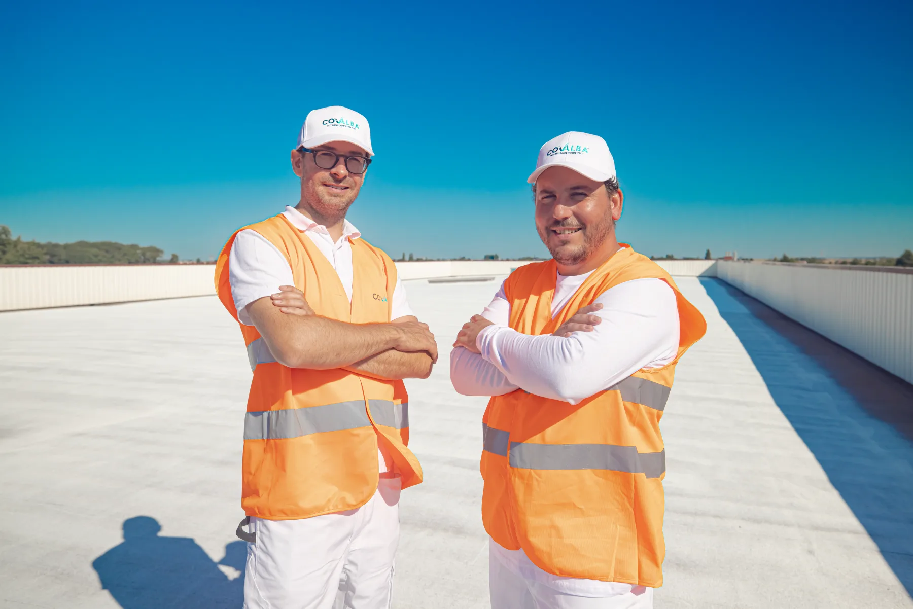 Maxime and Bertrand, Covalba founders, on a roof during intervention